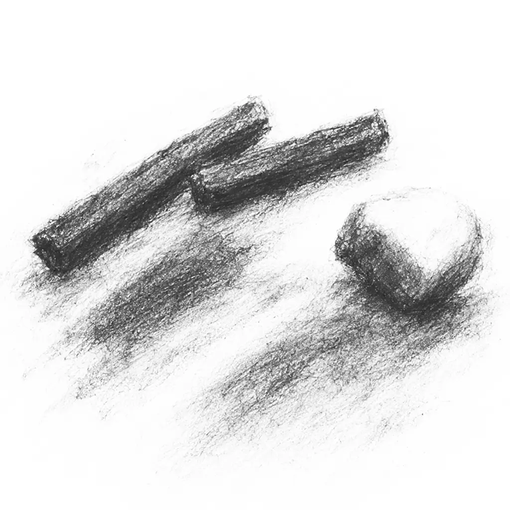 Charcoal sketch of charcoal sticks and a smudge on paper